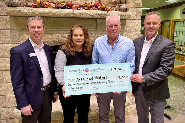 Feed_the_Pig_2022_Group_Photo_Decorah-1-720x480.jpg